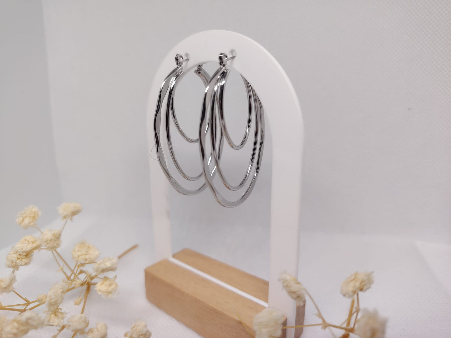 Boucles d’oreilles créoles ondulées en acier inoxydable – argentée