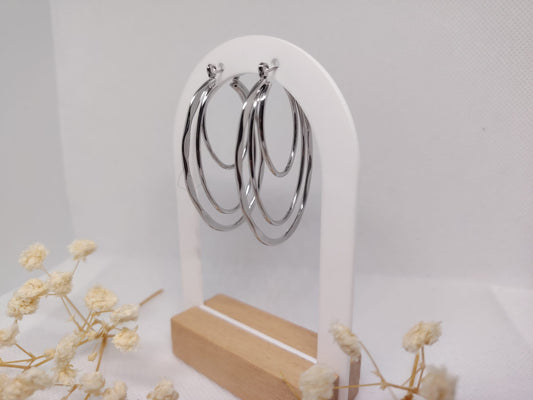 Boucles d’oreilles créoles ondulées en acier inoxydable –  argentée